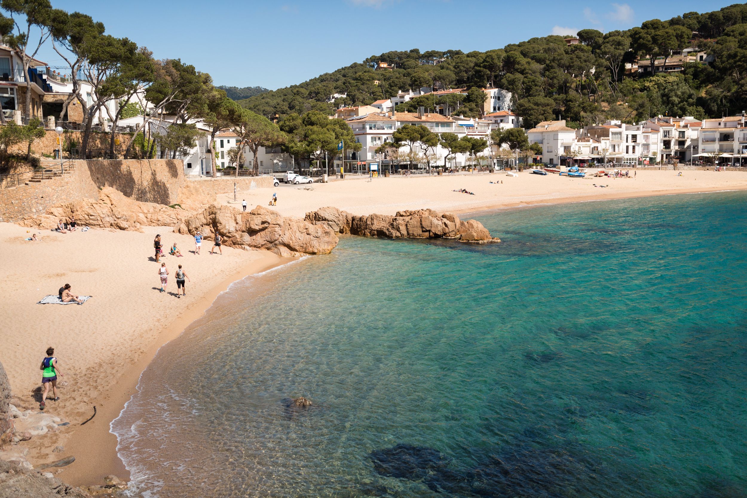 Running along the coast of  village of Tamariu